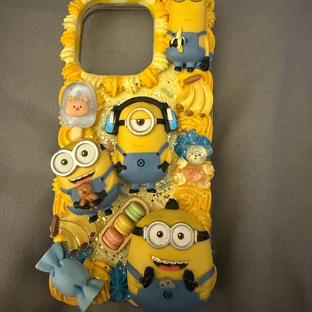 Yellow and Blue 3D Minion-Themed IPhone Case 16 pro
